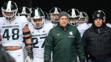 LINCOLN, NE - NOVEMBER 17: Head coach Mark Dantonio of the Michigan State Spartans walks on the field with the team before the game against the Nebraska Cornhuskers at Memorial Stadium on November 17, 2018 in Lincoln, Nebraska. (Photo by Steven Branscombe/Getty Images)