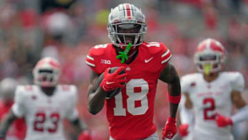 Sep 09, 2023; Columbus, OH, USA; Ohio State Buckeyes wide receiver Marvin Harrison Jr. (18) runs in a touchdown in the first quarter of their NCAA football game against Youngstown State.