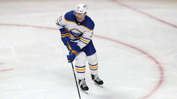 Feb 13, 2022; Montreal, Quebec, CAN; Buffalo Sabres defenseman Mattias Samuelsson (23) plays the puck against Montreal Canadiens during the second period at Bell Centre. Mandatory Credit: Jean-Yves Ahern-USA TODAY Sports