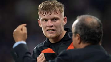 HUDDERSFIELD, ENGLAND - AUGUST 24: Jarrad Branthwaite of Everton takes instructions form manager Rafael Benitez during the Carabao Cup second round match between Huddersfield Town and Everton at the John Smith"u2019s Stadium on August 24, 2021 in Huddersfield, England. (Photo by Visionhaus/Getty Images)