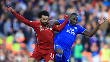 27th October 2018, Anfield, Liverpool, England; EPL Premier League football, Liverpool versus Cardiff City; Mohamed Salah of Liverpool and Souleymane Bamba of Cardiff City compete for the ball (photo by David Blunsden/Action Plus via Getty Images)