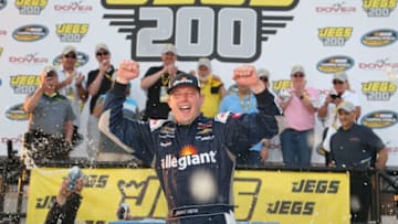 DOVER, DE - MAY 04: Johnny Sauter, driver of the #21 Allegiant Airlines Chevrolet, celebrates in victory lane after winning the NASCAR Camping World Truck Series JEGS 200 at Dover International Speedway on May 4, 2018 in Dover, Delaware. (Photo by Brian Lawdermilk/Getty Images)