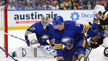 Oct 6, 2023; Buffalo, New York, USA; Buffalo Sabres goaltender Devon Levi (27) watches as defenseman Henri Jokiharju (10) tries to block a pass during the first period against the Pittsburgh Penguins at KeyBank Center. Mandatory Credit: Timothy T. Ludwig-USA TODAY Sports