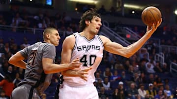 Jan 21, 2016; Phoenix, AZ, USA; San Antonio Spurs center Boban Marjanovic (40) against Phoenix Suns center Alex Len at Talking Stick Resort Arena. The Spurs defeated the Suns 117-89. Mandatory Credit: Mark J. Rebilas-USA TODAY Sports