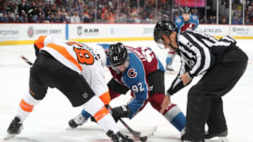 DENVER, CO - OCTOBER 06: Gabriel Landeskog #92 of the Colorado Avalanche faces off against Claude Giroux #28 of the Philadelphia Flyers at the Pepsi Center on October 6, 2018 in Denver, Colorado. (Photo by Michael Martin/NHLI via Getty Images)
