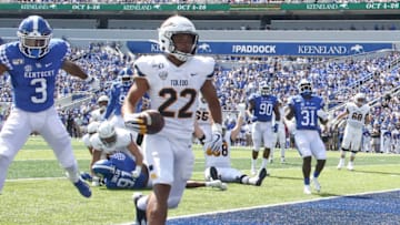 Aug 31, 2019; Lexington, KY, USA; Toledo Rockets running back Bryant Koback (22) runs for a touchdown against the Kentucky Wildcats at Kroger Field. Mandatory Credit: Mark Zerof-USA TODAY Sports