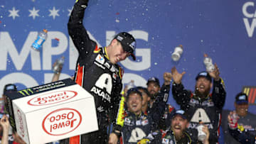 JOLIET, ILLINOIS - JUNE 30: Alex Bowman, driver of the #88 Axalta Chevrolet, celebrates in Victory Lane after winning the Monster Energy NASCAR Cup Series Camping World 400 at Chicagoland Speedway on June 30, 2019 in Joliet, Illinois. (Photo by Matt Sullivan/Getty Images)
