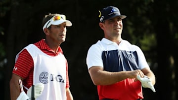 ST LOUIS, MO - AUGUST 09: Gary Woodland of the United States stands with caddie Brennan Little on the 18th tee during the first round of the 2018 PGA Championship at Bellerive Country Club on August 9, 2018 in St Louis, Missouri. (Photo by Jamie Squire/Getty Images)