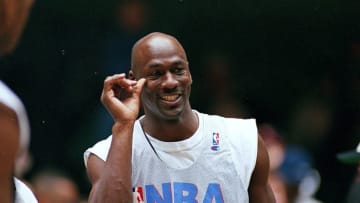 9 Feb 1997: Michael Jordan #23 of the Chicago Bulls smiles on the court during the NBA All-Star Practice at the Gund Arena in Cleveland, Ohio.The East defeated the West 132-120 .