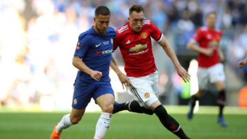 Manchester United's Phil Jones fouls Chelsea's Eden Hazard (Photo by Nick Potts/PA Images via Getty Images)