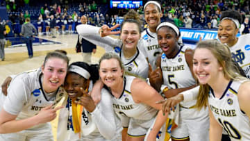 SOUTH BEND, IN - MARCH 18: Notre Dame Fighting Irish's Arike Ogunbowale (24), Notre Dame Fighting Irish's Jessica Shepard (23), Notre Dame Fighting Irish's Jackie Young (5) and teammates celebrate after defeating the Villanova Wildcats during the second round of the Division I Women's Championship on March 18, 2018 in South Bend, Indiana. (Photo by Quinn Harris/Icon Sportswire via Getty Images)