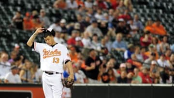 Sep 21, 2016; Baltimore, MD, USA; Baltimore Orioles third baseman Manny Machado (13) looks on in the eighth inning against the Boston Red Sox at Oriole Park at Camden Yards. Mandatory Credit: Evan Habeeb-USA TODAY Sports