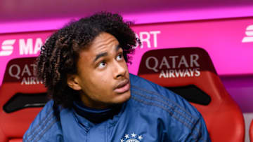 MUNICH, GERMANY - DECEMBER 21: (BILD ZEITUNG OUT) Joshua Zirkzee of FC Bayern Muenchen looks on, sits on the bench during the Bundesliga match between FC Bayern Muenchen and VfL Wolfsburg at Allianz Arena on December 21, 2019 in Munich, Germany. (Photo by TF-Images/Getty Images)