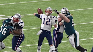 MINNEAPOLIS, MN - FEBRUARY 04: Tom Brady #12 of the New England Patriots throws a pass against the Philadelphia Eagles during Super Bowl LII at U.S. Bank Stadium on February 4, 2018 in Minneapolis, Minnesota. The Eagles defeated the Patriots 41-33. (Photo by Focus on Sport/Getty Images) *** Local Caption *** Tom Brady