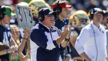 Sep 25, 2021; Chicago, Illinois, USA; Notre Dame Fighting Irish head coach Brian Kelly instructs players during the first half against the Wisconsin Badgers at Soldier Field. Mandatory Credit: Patrick Gorski-USA TODAY Sports