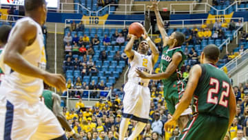 Nov 14, 2016; Morgantown, WV, USA; West Virginia Mountaineers guard Jevon Carter (2) shoots a three pointer during the second half against the Mississippi Valley State Delta Devils at WVU Coliseum. Mandatory Credit: Ben Queen-USA TODAY Sports