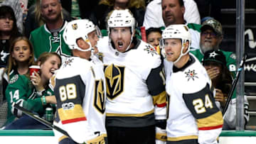 DALLAS, TX - OCTOBER 06: Nate Schmidt #88, James Neal #18 and Oscar Lindberg #24 of the Vegas Golden Knights react after Neal scored a goal against the Dallas Stars during the season opening game at American Airlines Center on October 6, 2017 in Dallas, Texas. (Photo by David Becker/NHLI via Getty Images)