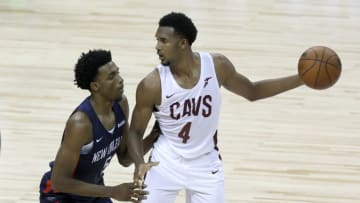 Evan Mobley #4 of the Cleveland Cavaliers is guarded by Herbert Jones #5 of the New Orleans Pelicans (Photo by Ethan Miller/Getty Images)