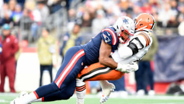 Nov 14, 2021; Foxborough, Massachusetts, USA; New England Patriots defensive end Deatrich Wise (91) draws a penalty for a late hit on Cleveland Browns quarterback Baker Mayfield (6) during the second half at Gillette Stadium. Mandatory Credit: Brian Fluharty-USA TODAY Sports