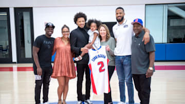 From left, Ashton Bennings, Kaylyn Cunningham, Detroit Pistons draft pick Cade Cunningham, Riley Cunningham, Carrie Cunningham, Cannen Cunningham and Keith Cunningham (Photo by Nic Antaya/Getty Images)