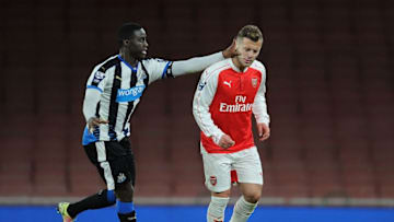 LONDON, ENGLAND - APRIL 08: Jack Wilshere of Arsenal pushed in the face by Newcastle's Henri Saivet during the Barclays Premier League match between Arsenal and Newcastle United at Emirates Stadium on April 8, 2016 in London, England. (Photo by Stuart MacFarlane/Arsenal FC via Getty Images)