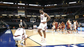 INDIANAPOLIS, INDIANA - MARCH 21: Andre Curbelo #5 and Da'Monte Williams #20 of the Illinois Fighting Illini react in the final moments of the second half against the Loyola Chicago Ramblers in the second round game of the 2021 NCAA Men's Basketball Tournament at Bankers Life Fieldhouse on March 21, 2021 in Indianapolis, Indiana. (Photo by Sarah Stier/Getty Images)