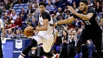 Jan 19, 2016; New Orleans, LA, USA; New Orleans Pelicans forward Anthony Davis (23) drives past Minnesota Timberwolves center Karl-Anthony Towns (32) during the second half of a game at the Smoothie King Center. The Pelicans defeated the Timberwolves 114-99. Mandatory Credit: Derick E. Hingle-USA TODAY Sports