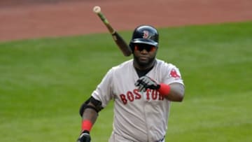 Oct 4, 2015; Cleveland, OH, USA; Boston Red Sox designated hitter David Ortiz (34) tosses his bat after walking in the sixth inning against the Cleveland Indians at Progressive Field. Mandatory Credit: David Richard-USA TODAY Sports