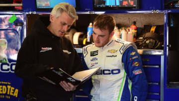 FONTANA, CA - MARCH 16: Ty Dillon, driver of the #13 GEICO Chevrolet, and his crew chief Matt Borland review notes in the garage area during practice for the Monster Energy NASCAR Cup Series Auto Club 400 at Auto Club Speedway on March 16, 2019 in Fontana, California. (Photo by Jared C. Tilton/Getty Images)