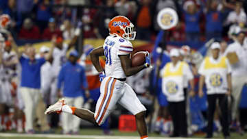 Dec 5, 2015; Atlanta, GA, USA; Florida Gators wide receiver Antonio Callaway (81) runs for an 85 yard punt return for a touchdown against the Alabama Crimson Tide during the second quarter of the 2015 SEC Championship Game at the Georgia Dome. Mandatory Credit: Jason Getz-USA TODAY Sports