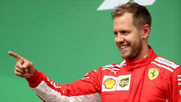 MONTREAL, QC - JUNE 10: Race winner Sebastian Vettel of Germany and Ferrari (Photo by Charles Coates/Getty Images)