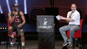 Dwyane Wade (L) of the Miami Heat and Eric Reid attend the NBA Championship victory rally (Photo by Alexander Tamargo/Getty Images)