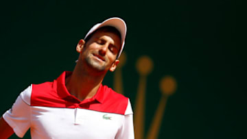 MONTE-CARLO, MONACO - APRIL 19: Novak Djokovic of Serbia reacts during his men's singles match against Dominic Thiem of Austria on day five of the Rolex Monte-Carlo Masters at Monte-Carlo Sporting Club on April 19, 2018 in Monte-Carlo, Monaco. (Photo by Julian Finney/Getty Images)