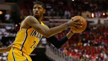 May 15, 2014; Washington, DC, USA; Indiana Pacers forward Paul George (24) holds the ball against the Washington Wizards in game six of the second round of the 2014 NBA Playoffs at Verizon Center. Mandatory Credit: Geoff Burke-USA TODAY Sports