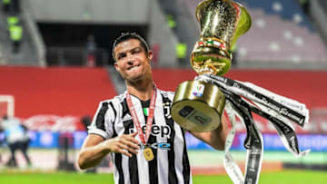 Juventus' Portuguese forward Cristiano Ronaldo holds the cup after Juevntus won the final of the Italian Cup (Coppa Italia) football match Atalanta vs Juventus on May 19, 2021 at the Citta del Tricolore stadium in Reggio Emilia. (Photo by Miguel MEDINA / AFP) (Photo by MIGUEL MEDINA/AFP via Getty Images)