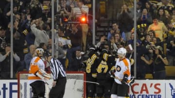 Apr 5, 2014; Boston, MA, USA; The Boston Bruins celebrate a goal during the third period against the Philadelphia Flyers at TD Banknorth Garden. Mandatory Credit: Bob DeChiara-USA TODAY Sports