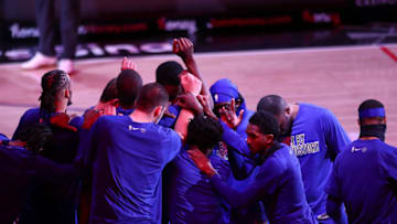 LOS ANGELES, CALIFORNIA - FEBRUARY 17: The LA Clippers huddle ahead of their game against the Utah Jazz at Staples Center on February 17, 2021 in Los Angeles, California. NOTE TO USER: User expressly acknowledges and agrees that, by downloading and or using this photograph, User is consenting to the terms and conditions of the Getty Images License Agreement. (Photo by Meg Oliphant/Getty Images)