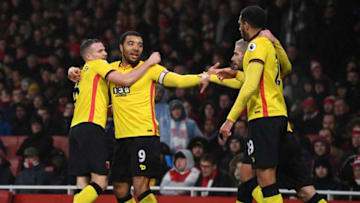 LONDON, ENGLAND - JANUARY 31: Troy Deeney (2nd L) of Watford celebrates scoring his team's second goal with his team mates during the Premier League match between Arsenal and Watford at Emirates Stadium on January 31, 2017 in London, England. (Photo by Mike Hewitt/Getty Images)