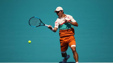 MIAMI GARDENS, FLORIDA - MARCH 22: Kei Nishikori of Japan in action against Dusan Lajovic of Serbia during day five of the Miami Open Tennis on March 22, 2019 in Miami Gardens, Florida. (Photo by Julian Finney/Getty Images)