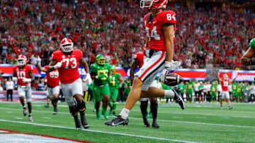 ATLANTA, GA - SEPTEMBER 03: Ladd McConkey #84 of the Georgia Bulldogs scores a touchdown during the first half against the Oregon Ducks at Mercedes-Benz Stadium on September 3, 2022 in Atlanta, Georgia. (Photo by Todd Kirkland/Getty Images)