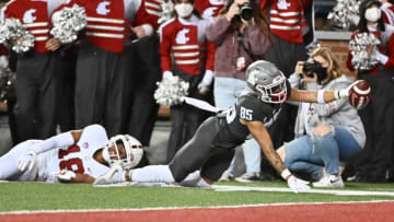 Oct 16, 2021; Pullman, Washington, USA; Washington State Cougars wide receiver Lincoln Victor (85) is stopped short of the goal line by Stanford Cardinal cornerback Jimmy Wyrick (18) in the second half at Gesa Field at Martin Stadium. The Cougars won 34-31. Mandatory Credit: James Snook-USA TODAY Sports