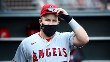 SAN FRANCISCO, CALIFORNIA - AUGUST 19: Mike Trout #27 of the Los Angeles Angels wears a mask in the dugout before their game against the San Francisco Giants at Oracle Park on August 19, 2020 in San Francisco, California. (Photo by Ezra Shaw/Getty Images)