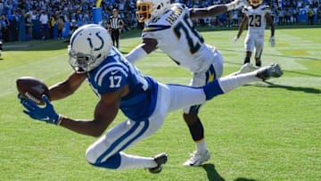Sep 8, 2019; Carson, CA, USA; Indianapolis Colts wide receiver Devin Funchess (17) canÕt hang onto the ball on a pass I the end zone in the closing minute of regulation against the Los Angeles Chargers at Dignity Health Sports Park. Defending on the play is Los Angeles Chargers defensive back Brandon Facyson (28). Mandatory Credit: Robert Hanashiro-USA TODAY Sports
