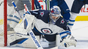 Winnipeg Jets, Eric Comrie (1). Mandatory Credit: Bob Frid-USA TODAY Sports