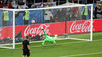 MOSCOW, RUSSIA - JULY 03: Jordan Pickford of England fails to save Juan Cuadrado of Colombia (not pictured) penalty during the 2018 FIFA World Cup Russia Round of 16 match between Colombia and England at Spartak Stadium on July 3, 2018 in Moscow, Russia. (Photo by Alex Morton/Getty Images)