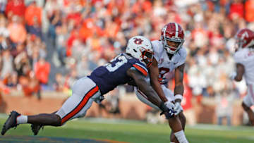 Auburn footballNov 27, 2021; Auburn, Alabama, USA; Auburn Tigers cornerback Roger McCreary (23) breaks up a pass intended for Alabama Crimson Tide wide receiver John Metchie III (8) during the second quarter at Jordan-Hare Stadium. Mandatory Credit: John Reed-USA TODAY Sports