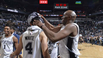 SAN ANTONIO, TX - APRIL 18: Derrick White #4 of the San Antonio Spurs celebrates with teammates after Game Three of Round One of the 2019 NBA Playoffs against the Denver Nuggets on April 18, 2019 at the AT&T Center in San Antonio, Texas. NOTE TO USER: User expressly acknowledges and agrees that, by downloading and or using this photograph, user is consenting to the terms and conditions of the Getty Images License Agreement. Mandatory Copyright Notice: Copyright 2019 NBAE (Photos by Mark Sobhani/NBAE via Getty Images)