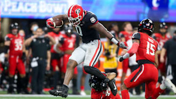Jan 1, 2021; Atlanta, GA, USA; Georgia Bulldogs tight end Darnell Washington (0) runs after a catch against the Cincinnati Bearcats in the first quarter of the Chick-fil-A Peach Bowl at Mercedes-Benz Stadium. Mandatory Credit: Brett Davis-USA TODAY Sports