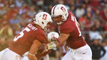 September 2, 2016; Stanford, CA, USA; Stanford Cardinal quarterback Ryan Burns (17) hands the football off to running back Christian McCaffrey (5) against the Kansas State Wildcats during the first quarter at Stanford Stadium. Mandatory Credit: Kyle Terada-USA TODAY Sports