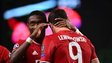 Bayern Munich's Polish forward Robert Lewandowski celebrates with Bayern Munich's Austrian defender David Alaba (L) after scoring a goal during the UEFA Champions League semi-final football match between Lyon and Bayern Munich at the Jose Alvalade stadium in Lisbon on August 19, 2020. (Photo by FRANCK FIFE / POOL / AFP) (Photo by FRANCK FIFE/POOL/AFP via Getty Images)
